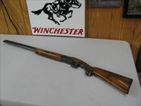 7579 Winchester 101 20 gauge 26 inch barrels ic/modhard to find RED W ON PISTOL GIP CAP-1st 3 years of production. ejectors, red viz front site, white mid bead, opens/closes tite, bores brite/shiny, 97-98% condition. hard to find in this  Img-1