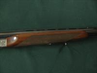 6611 Winchester 23 Pigeon XTR 20 gauge 26 inch barrels, 4chokes sk ic im f and wrench, 2 3/4 & 3 inch chambers, vent rib, single select trigger ejectors, round knob rose and scroll coin silver engraved receiver,TIGER STRIPED WALNUT  Img-7