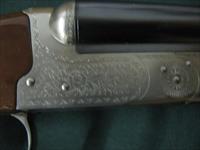 6611 Winchester 23 Pigeon XTR 20 gauge 26 inch barrels, 4chokes sk ic im f and wrench, 2 3/4 & 3 inch chambers, vent rib, single select trigger ejectors, round knob rose and scroll coin silver engraved receiver,TIGER STRIPED WALNUT  Img-9