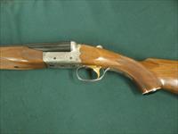 7183 Ithaca 280 E 12 gauge 28 inch barrel 2 3/4 chamber, mod/full raised rib, single select trigger, ejectors, pistol grip with cap. all original white line pad 14 1/4 lop, scalloped receiver, rose/scroll coin silver engraved receiver, 97+% Img-3