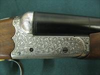 7183 Ithaca 280 E 12 gauge 28 inch barrel 2 3/4 chamber, mod/full raised rib, single select trigger, ejectors, pistol grip with cap. all original white line pad 14 1/4 lop, scalloped receiver, rose/scroll coin silver engraved receiver, 97+% Img-12