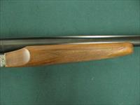 7183 Ithaca 280 E 12 gauge 28 inch barrel 2 3/4 chamber, mod/full raised rib, single select trigger, ejectors, pistol grip with cap. all original white line pad 14 1/4 lop, scalloped receiver, rose/scroll coin silver engraved receiver, 97+% Img-15