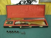 6925 Winchester 101 Lightweight 12 gauge, 27 inch barrels, 6 Winchester screw in flush chokes,key, wrench,correct Winchester case,Winchester butt pad, ALL ORIGINAL,coin silver receiver with quail/pheasant engraved hunting scene,bores brite  Img-2
