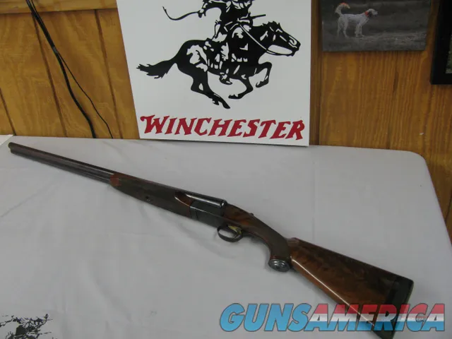 7703 Winchester 23 HEAVY DUCK 12 gauge 30 inch barrel mod/mod, pistol grip with cap, solid rib,white front bead, Decelerator pad 14 3/8 lop, AAA++fancy figured walnut, ejectors,single select trigger,HEAVY DUCK  on bottom of receiver in gold Img-1