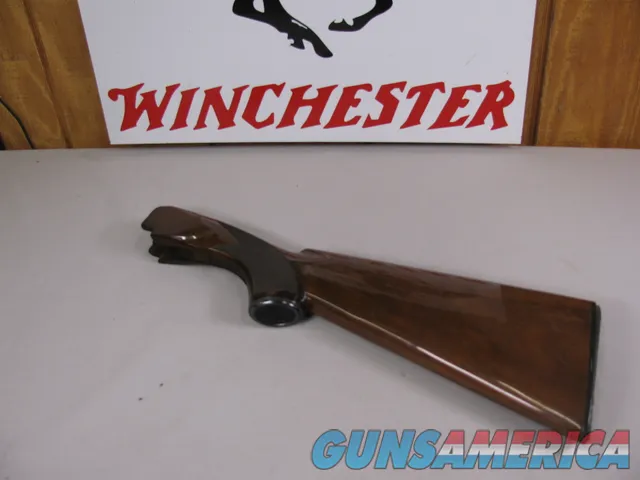 8109  Winchester 101 20 gauge wood stock, length of wood is 16”