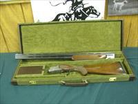 6922  Winchester 101 Pigeon Lightweight 28 gauge 28 inch barrels,ic/mod,Quail/Snipe coin silver engraved receiver,baby frame, round knob,Winchester butt pad, Winchester case,ejectors, vent rib, single select trigger,96% condition, AAA Fancy Img-2
