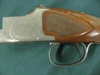 6922  Winchester 101 Pigeon Lightweight 28 gauge 28 inch barrels,ic/mod,Quail/Snipe coin silver engraved receiver,baby frame, round knob,Winchester butt pad, Winchester case,ejectors, vent rib, single select trigger,96% condition, AAA Fancy Img-4