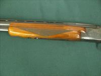 6932 Winchester 101 Field 20 gauge 26 inch barrels ic/mod, pistol grip with cap, all original, ejectors, Winchester butt plate, single brass front bead, TIGER STRIPPED FIGURED WALNUT STOCK, 95% condition. opens closes tite, bores/brite/shin Img-4