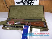 7899   Winchester 101 XTR Super Grade 12ga30-06 cal COMBO , Leupold M8-4X 