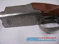 7899   Winchester 101 XTR Super Grade 12ga30-06 cal COMBO , Leupold M8-4X 