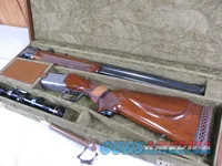 7899   Winchester 101 XTR Super Grade 12ga30-06 cal COMBO , Leupold M8-4X 
