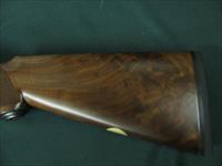 6514 Winchester 23 Classic 20 gauge 2 3/4 & 3inch chambers, ic/mod, pistol grip, vent rib ejectors, all original 99.9% AA++Fancy Walnut. Gold raised relief pheasant on bottom of receiver.Ebony insert in forend, bores brite/shiny opens close Img-2