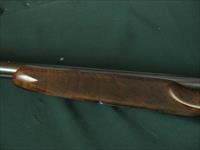 6514 Winchester 23 Classic 20 gauge 2 3/4 & 3inch chambers, ic/mod, pistol grip, vent rib ejectors, all original 99.9% AA++Fancy Walnut. Gold raised relief pheasant on bottom of receiver.Ebony insert in forend, bores brite/shiny opens close Img-4