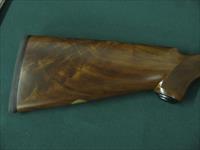 6514 Winchester 23 Classic 20 gauge 2 3/4 & 3inch chambers, ic/mod, pistol grip, vent rib ejectors, all original 99.9% AA++Fancy Walnut. Gold raised relief pheasant on bottom of receiver.Ebony insert in forend, bores brite/shiny opens close Img-5