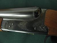 6514 Winchester 23 Classic 20 gauge 2 3/4 & 3inch chambers, ic/mod, pistol grip, vent rib ejectors, all original 99.9% AA++Fancy Walnut. Gold raised relief pheasant on bottom of receiver.Ebony insert in forend, bores brite/shiny opens close Img-11