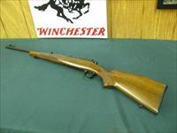 6968 Winchester Model 70 FEATHERWEIGHT 243 cal. 22 inch barrel, Hooded front site, sling swivels, butt plate, mfg 1959 PRE 64, 97-98% condition.all original and in excellent collector condition. Img-1