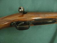 6968 Winchester Model 70 FEATHERWEIGHT 243 cal. 22 inch barrel, Hooded front site, sling swivels, butt plate, mfg 1959 PRE 64, 97-98% condition.all original and in excellent collector condition. Img-10
