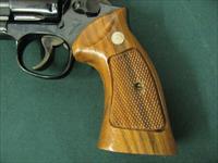 7301 Smith Wesson 14-4 38 special 8 3/8 inch barrel, adjustable rear site, medallion grips of walnut.NOt a mark on it. As new in box, papers tool and correct box. what a collectors piece. Img-4