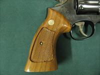 7301 Smith Wesson 14-4 38 special 8 3/8 inch barrel, adjustable rear site, medallion grips of walnut.NOt a mark on it. As new in box, papers tool and correct box. what a collectors piece. Img-7