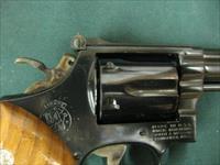 7301 Smith Wesson 14-4 38 special 8 3/8 inch barrel, adjustable rear site, medallion grips of walnut.NOt a mark on it. As new in box, papers tool and correct box. what a collectors piece. Img-8