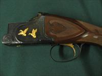 6542 Winchester Model 101 SUPER PIGEON 12ga 27bls extended chokes 2sk,ic,im,mod, flush ic,mod, im,2xf,GOLD RAISED RELIEF 2DUCKS 3 BIRDS DOG PIGEON round knob, Winchester butt pad all original,fleur-des-lies hand checkered Full LEATHER WINCH Img-3