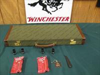 6940 Winchester model Pigeon XTR 12 gauge 27 barrels, 6 winchokes, sk,ic,mod,im,f,xf,2 pouches, wrench, keys, all complete and original 98% condition, Winchester case, Winchester butt pad, rose and scroll coin silver engraved receiver. this Img-1