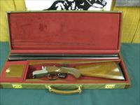6940 Winchester model Pigeon XTR 12 gauge 27 barrels, 6 winchokes, sk,ic,mod,im,f,xf,2 pouches, wrench, keys, all complete and original 98% condition, Winchester case, Winchester butt pad, rose and scroll coin silver engraved receiver. this Img-2