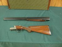6940 Winchester model Pigeon XTR 12 gauge 27 barrels, 6 winchokes, sk,ic,mod,im,f,xf,2 pouches, wrench, keys, all complete and original 98% condition, Winchester case, Winchester butt pad, rose and scroll coin silver engraved receiver. this Img-3