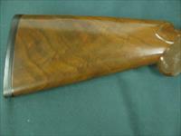 6940 Winchester model Pigeon XTR 12 gauge 27 barrels, 6 winchokes, sk,ic,mod,im,f,xf,2 pouches, wrench, keys, all complete and original 98% condition, Winchester case, Winchester butt pad, rose and scroll coin silver engraved receiver. this Img-8