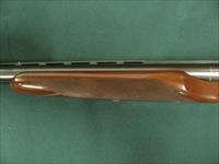6940 Winchester model Pigeon XTR 12 gauge 27 barrels, 6 winchokes, sk,ic,mod,im,f,xf,2 pouches, wrench, keys, all complete and original 98% condition, Winchester case, Winchester butt pad, rose and scroll coin silver engraved receiver. this Img-13