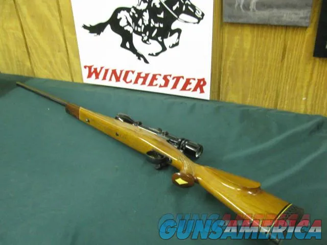 7257 Winslownot marked COMMANDER MODEL ON BUSHMASTER STOCK Custom rifle mfg in Florida Circa 1975, Belgium Mauser 98 action, only approx 500 mfg,7 mm REM MAGnot marked and no SERIAL NUMBER, 26 inch barrel NO INLAY SHIELD,claw extractor, Img-1