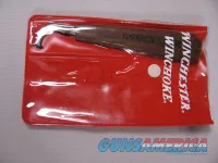 7836  Winchester wood handled chokes wrench and Winchester choke bag-NOS- These are in fantastic condition. Finish off your collectible shotgun! 