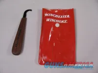 7836  Winchester wood handled chokes wrench and Winchester choke bag-NOS- These are in fantastic condition. Finish off your collectible shotgun! 