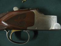 6562 Winchester Quail Special 20ga  3inch chambers,8 winchokes 2sk,2ic, 2mod, 2full, 3choke pouches, wrench,snap caps,STRAIGHT GRIP,CORRECT Winchester Case,only 500 made,AAA+Fancy figured Walnut, coin silver dog quail engraved receiver,vent Img-11