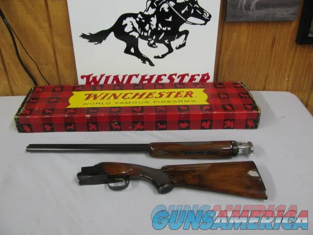 7636 Winchester 101 field 20 gauge 26 inch barrels, ic/modmost desired chokes, ejectors, pistol grip with cap, Winchester butt plate, 2 white beads,vent rib, blue receiver engraved rose/scroll, is the early good one with A+ dark wood, dia Img-1