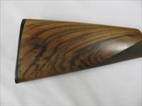 7563 CSM RBL 2 barrel set 28 gauge, 30 inch barrel skeet/skeet, 30 inch barrel ic/lm. STRAIGHT GRIP BEAVERTAIL, 3X English Walnut, double triggers, ejectors, butt plate,engraved receiver with pointer and setter,single front brass site, 99%  Img-6