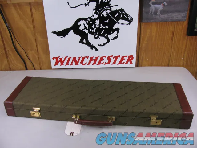 7817  Winchester  Green case with leather trim with keys, green interior. Will take 29" barrels. 97% condition 