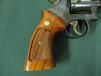 7302 Smith Wesson 586 357 Mag  6 inch barrel New in box, not a mark on it. papers tools correct book, adjustable rear site, high polish blue. medallion walnut grips. Collectors Quality Img-7