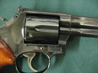 7302 Smith Wesson 586 357 Mag  6 inch barrel New in box, not a mark on it. papers tools correct book, adjustable rear site, high polish blue. medallion walnut grips. Collectors Quality Img-9