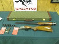 6886 Winchester 101 Lightweight 12 gauge 27 inch barrels 8 Winchokes 2sk 2ic 2mod 2 full, 2 wrenches,keys, 2 pouches, correct Winchester case, coin silver engraved pheasants/quail/chukkars,pistol grip, ejectors, Winchester pad, all original Img-1