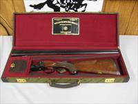 7571 Winchester 23 Classic 28 gauge 26 inch barrels, ic and mod, single select trigger, ejectors, vent rib, pistol grip with cap, Winchester butt pad, Gold raised relief quail on bottom of receiver, AAA+ Fancy Walnut, Winchester case and ke Img-2