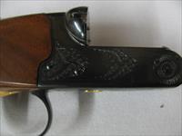 7571 Winchester 23 Classic 28 gauge 26 inch barrels, ic and mod, single select trigger, ejectors, vent rib, pistol grip with cap, Winchester butt pad, Gold raised relief quail on bottom of receiver, AAA+ Fancy Walnut, Winchester case and ke Img-8