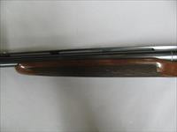 7571 Winchester 23 Classic 28 gauge 26 inch barrels, ic and mod, single select trigger, ejectors, vent rib, pistol grip with cap, Winchester butt pad, Gold raised relief quail on bottom of receiver, AAA+ Fancy Walnut, Winchester case and ke Img-13