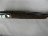 7571 Winchester 23 Classic 28 gauge 26 inch barrels, ic and mod, single select trigger, ejectors, vent rib, pistol grip with cap, Winchester butt pad, Gold raised relief quail on bottom of receiver, AAA+ Fancy Walnut, Winchester case and ke Img-14