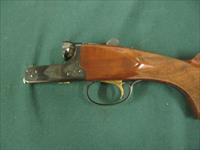  7129 Winchester 23 Classic 12 gauge 26 inch barrels,ic/mod,NEW IN CORRECT SERIALIZED BOX, HANG TAG, PAMPHLET,AAA+Fancy Walnut--unfired--gold raised relief pheasant, BEAVER TAIL, single select trigger,pistol grip ejectors vent rib Wincheste Img-4