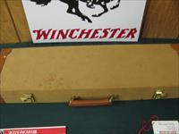 6744 Winchester Golden Quail 410 gauge 26 barrels m/f solid rib ejectors, single select trigger, Winchester pad,all original, Quail/dogs engraved coin silver receiver,99.9% condition,AS NEW IN CASE, pamphlet,paper, #415 out of 500. AAA++Fan