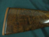 6744 Winchester Golden Quail 410 gauge 26 barrels m/f solid rib ejectors, single select trigger, Winchester pad,all original, Quail/dogs engraved coin silver receiver,99.9% condition,AS NEW IN CASE, pamphlet,paper, #415 out of 500. AAA++Fan