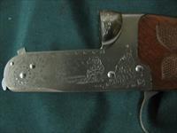 6744 Winchester Golden Quail 410 gauge 26 barrels m/f solid rib ejectors, single select trigger, Winchester pad,all original, Quail/dogs engraved coin silver receiver,99.9% condition,AS NEW IN CASE, pamphlet,paper, #415 out of 500. AAA++Fan