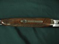 6744 Winchester Golden Quail 410 gauge 26 barrels m/f solid rib ejectors, single select trigger, Winchester pad,all original, Quail/dogs engraved coin silver receiver,99.9% condition,AS NEW IN CASE, pamphlet,paper, #415 out of 500. AAA++Fan