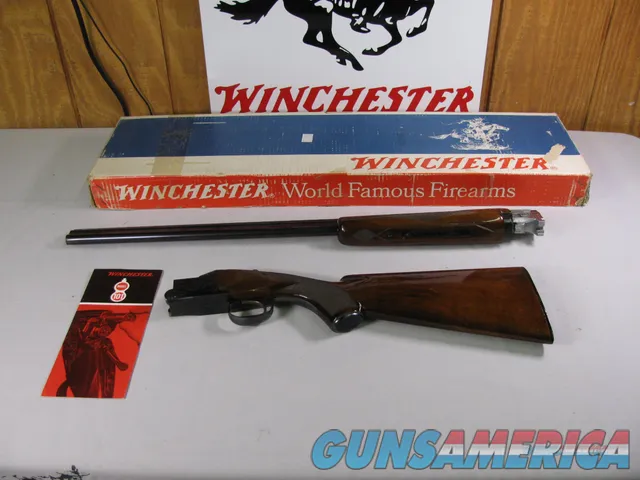 7725 Winchester 101 field skeet 28 gauge 28 inch barrels sk/sk 98+ % condition, WINCHESTER BROCHURE, CORRECT WINCHESTER SERIALIZED BOX TO GUN, pistol grip with cap, vent rib, ejectors, Winchester butt plate, all original, 2 brass bead, hard